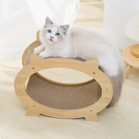 Image of a cat on top of a Cat Ear TV Shaped Cat Scratcher - Pets Villa. 