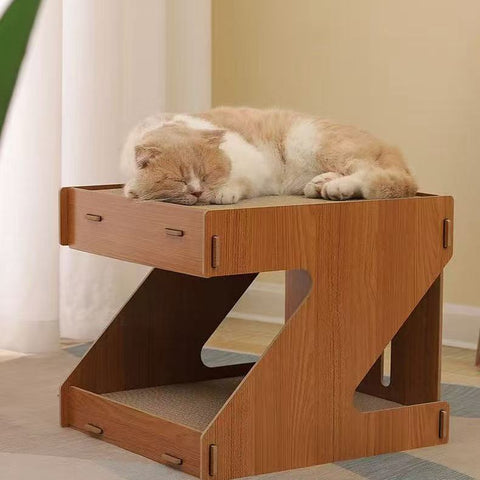 Image of a cat sleeping on Double Sided Z Shape Cat Scratcher Frame - Pets Villa. 
