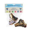 Packaging of JR Ostrich Knuckle Bone for dogs, displaying the product and its features such as being hypoallergenic, long lasting, and dental chew.