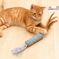 Image of a cat playing with PETS VILLA Yarn Catnip Tube Assorted - Pets Villa. 